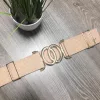 Rose gold színű gumis öv dupla ovális alakú arany csattal