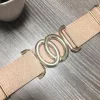 Rose gold színű gumis öv dupla ovális alakú arany csattal