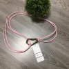 Púder rózsaszín műbőr két szálas aranyozott csatos öv
